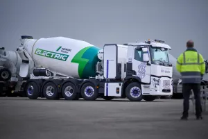 Renault Trucks E-Tech C 10x4 equipped with a Schwing Stetter concrete mixer, the first 100% electric concrete transport solution to decarbonize concrete transport, deliver in cities, and access low-emission zones (LEZs).