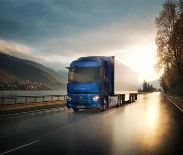 Renault Trucks E-Tech T 780 driving along a road beside a river